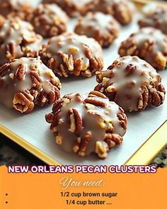 an advertisement for new orleans pecan clusters on a tray with nuts and icing