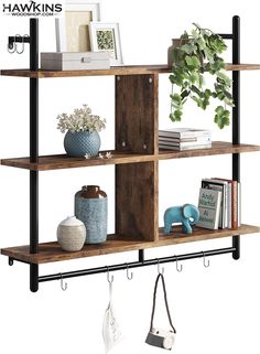 a shelf with some books and other items on top of it next to a potted plant