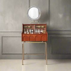 a small table with a mirror on top