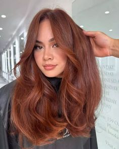 Step into warmth with this golden copper hairstyle, rich in fiery hues that glow with natural luster. Its flowing layers and whimsical waves shimmer in the light, enhancing her skin tone for a radiant look. Perfectly on-trend for 2024. Curious for more? Click to view our gallery and follow us on Pinterest. ** Photo Credit: Instagram @kainevakaihairartistry_salon Hair Color Golden, Warm Brown Red Hair, Copper Brown Hair, Golden Copper, Chocolate Hair, Brunette Hair With Highlights, Long Bob Haircuts