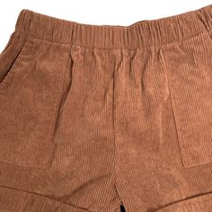 Retro Corduroy High Rise Shorts XL Brown Elastic Waist Large Pockets CuffedExcellent conditionWaist: 14" laying flat, unstretchedInseam: 3"Front rise: 12"100% PolyesterMade in ChinaAll pre-owned clothing has been laundered / washed according to eBay standards. Corduroy Bottoms With Relaxed Fit And Short Length, Corduroy Relaxed Fit Short Bottoms, Corduroy Shorts With Relaxed Fit, Stretch Shorts With Pockets For Fall, Relaxed Fit Corduroy Shorts With Pockets, High Waist Brown Corduroy Shorts, Brown High-waisted Corduroy Shorts, Brown High Waist Corduroy Shorts, Casual Short Corduroy Bottoms