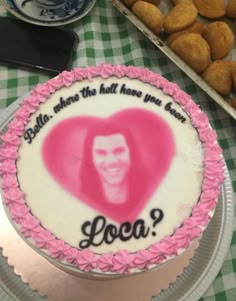 there is a cake that has been decorated with an image of a person on it