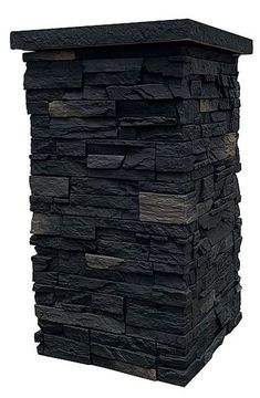 a tall black stone pillar on a white background