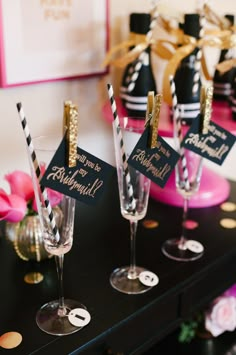 black and gold party decorations with champagne flutes