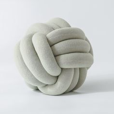 a white ball that is made out of yarn