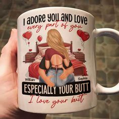 a person holding a coffee mug with the words i adore you and love every part of you