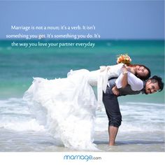 a bride and groom kissing on the beach