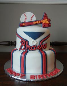 a baseball themed birthday cake on a table