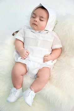 Looking for a special occasion outfit? Look no further than our Smocked Cross Baby Boy Christening Bubble. This outfit is made from a soft cotton blend and features a beautiful cross embroidery design. The coordinating hat is perfect for adding that extra touch of sophistication to your special day. This outfit is perfect for Christenings, Baptisms, or any other special event. The snap crotch closure ensures a comfortable and secure fit. We know that you will love our Smocked Cross Baby Boy Chri Baby Baptism Gifts, Baby Boy Christening Outfit, Baby Christening Outfit, Baby Boy Baptism Outfit, Boy Christening Outfit, Boy Baptism Outfit, Baby Boy Christening, Baby Boy Baptism, Cross Embroidery