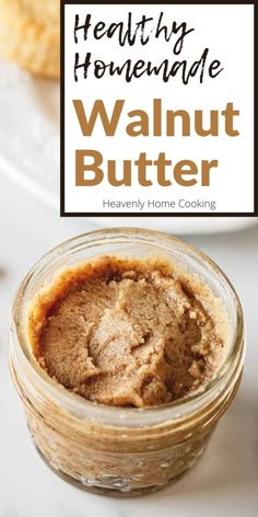 a jar filled with peanut butter next to cookies on a white plate and text overlay reads healthy homemade walnut butter heavenly home cooking