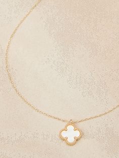 This delicate gold necklace features a double-sided clover charm, showcasing the iridescent beauty of mother-of-pearl on both sides. A timeless symbol of luck and love, this necklace is a beautiful and meaningful addition to any jewelry collection. Gold Mother Of Pearl Flower Pendant Jewelry, Dainty Gold Mother Of Pearl Necklace, Girly Christmas Gifts, Delicate Gold Necklace, Fabric Bracelets, Clover Charm, Clover Necklace, Accessories Jewelry Necklace, Jewelry Inspo