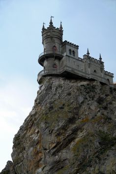 a castle built on top of a large rock