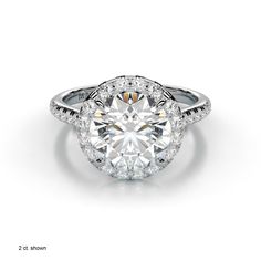 a round cut diamond ring with halos on the shoulders