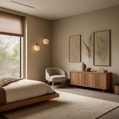 a bed room with a neatly made bed next to a large window and a chair