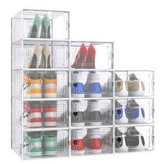 the shoe rack is filled with many pairs of shoes