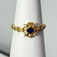 14k Gold Plated - Hypoallergenic - Everyday Wearable - Incredibly Sturdy - Vibrant Color - Looks Like Solid Gold For A Fraction Of The Price. S925 Sterling Silver - Solid Sterling Silver - Very Reflective - Hypoallergenic - Long Wear - Shine Can Be Restored With Polish Cloth Comes In A Dust Bag With A Polish Cloth. Sapphire Diamond Cut Promise Ring Jewelry, 14k Gold Blue Jewelry With Diamond Accents, 14k Gold Jewelry With Blue Diamond Accents, 14k Gold Jewelry With Diamond Accents In Blue, Adjustable Gold Sapphire Ring In Sterling Silver, Dainty Sapphire Jewelry With Diamond Accents, Elegant Royal Blue Sapphire Ring As Gift, Elegant Royal Blue Sapphire Ring Gift, Adjustable Blue 14k Gold Rings