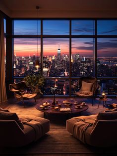 a living room filled with furniture and a large window overlooking the city at night time