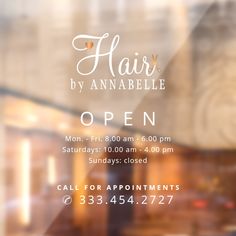 an advertisement for hair by anabellae is seen through the window in this image