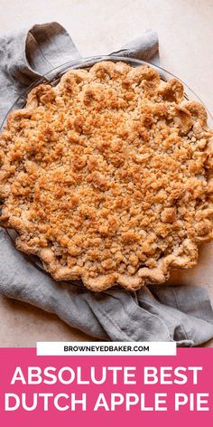 an apple pie on a plate with the words absolute best dutch apple pie above it