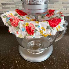 a blender sitting on top of a counter next to a tile backsplash