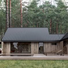 a small cabin in the middle of a forest with lots of grass and trees around it