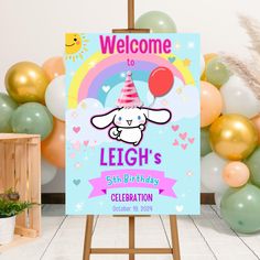 a welcome sign with balloons in the background