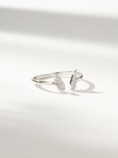 Dainty Angel Wings Ring Band in Gold | Uncommon James Angel Wing Jewelry, Dainty Angel Wings, Angel Wings Ring, Dainty Gold Band, Wings Ring, Angel Wing Ring, Uncommon James, Angel Wings Jewelry, Gold Angel Wings