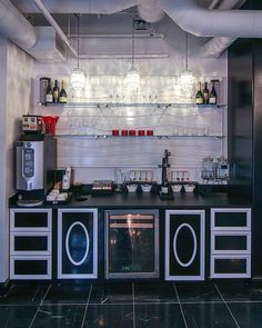 the kitchen is clean and ready to be used for wine tasting or as an appliance