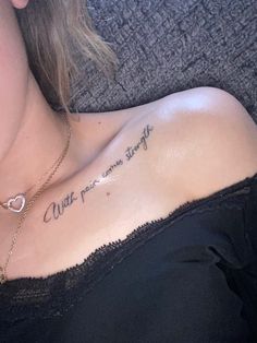 a woman with a heart tattoo on her chest and the words'little people struggle'written in cursive font