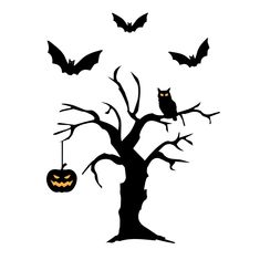 halloween tree with bats and pumpkins hanging from it