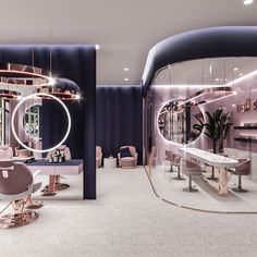 the interior of a salon with circular mirrors and pink chairs in front of purple walls