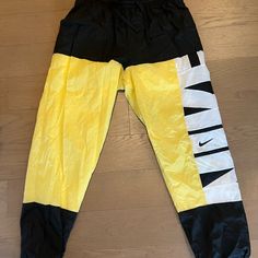 Never Worn Nike Joggers Cheap Nike Orange Bottoms, Yellow Athleisure Pants For Streetwear, Nike Athleisure Pants For Summer, Nike Sporty Summer Pants, Nike Summer Athleisure Pants, Yellow Athleisure Bottoms For Streetwear, Nike Yellow Sport Bottoms, Yellow Sports Pants For Spring, Yellow Sporty Nylon Bottoms