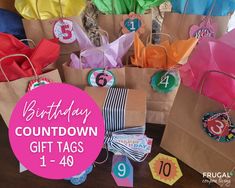 birthday gift tags are on brown paper bags with pink and blue ribbons around the top