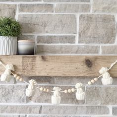 a wooden shelf with some decorations on it