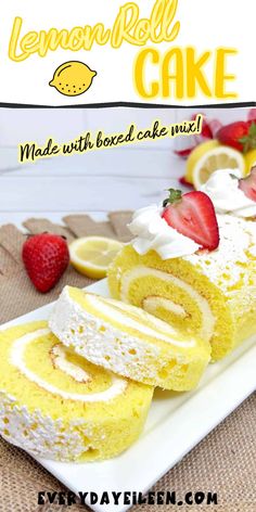 lemon roll cake on a white plate with strawberries and lemons in the background