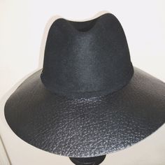 Nwot Vince Camuto Wide Brim Faux Leather And Suede Black Hat Spot Clean Brim: 3" Circumference: 13" Inner Circle 7" O/S, T/U Leather Brimmed Fedora For Everyday Wear, Everyday Leather Brimmed Fedora, Elegant Leather Fedora For Fall, Everyday Leather Fedora With Curved Brim, Everyday Leather Fedora With Short Brim, Leather Fedora For Fall, Fitted Leather Fedora For Fall, Elegant Leather Felt Hat For Fall, Black Fitted Leather Hat