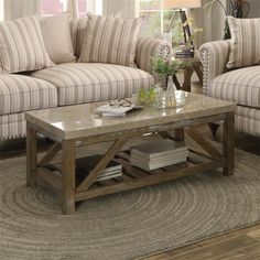 a living room with two couches and a coffee table