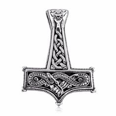 an ornate silver cross on a white background