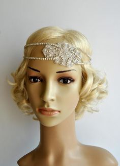 Stunning Clear Rhinestone Crystal Silver 1920s headpiece - flapper headband. Ready to ship Beautiful sparkling bridal , The Great Gatsby party or any special occasion rhinestone headpiece Can be worn many different styles. Made of - stunning clear rhinestone crystal silver headband - four lines of the rhinestone trim - embellished with large gorgeous sparking Art Deco rhinestone applique - with elastic in the back Simply adorable. All Blink. Elegant and classy. Old Hollywood Glam. Can be worn as The Great Gatsby Party, Vintage Bridal Hair Accessories, 1920s Hair Accessories, Wedding Gatsby, Vintage Bridal Hair, Speakeasy Party, Flapper Headpiece, Gatsby Headband, 1920s Headpiece