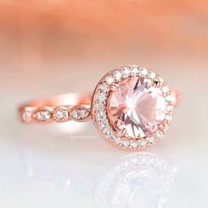 Elegant Pink Gold Rings With Bezel Setting, Elegant Pink Gold Ring With Bezel Setting, Elegant Pink Rings For Anniversary, Elegant Pink Ring For Anniversary, Formal Pink Halo Design Ring, Pink Formal Birthstone Ring, Elegant Pink Diamond Anniversary Ring, Formal Pink Birthstone Ring, Elegant Pink Diamond Ring For Anniversary