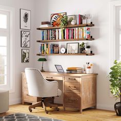 a home office with bookshelves above the desk