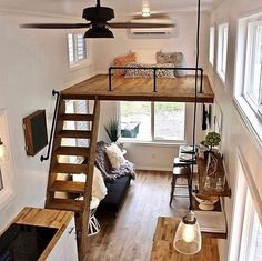 a loft style home with stairs leading up to the second floor