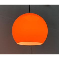 an orange light hanging from the ceiling