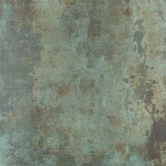 an old rusty metal surface with some rust on it