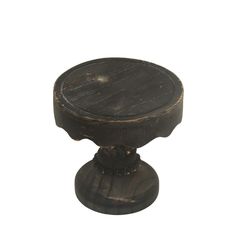 an old wooden knob on a white background