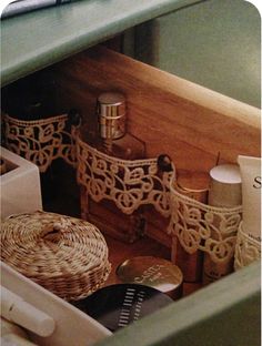 an open drawer filled with lots of different types of bathroom accessories and items in it