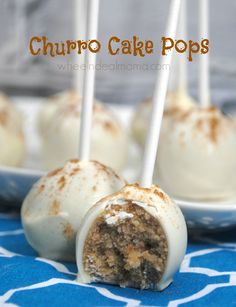 some cake pops are on a blue and white plate with the words churro cake pops