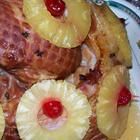 pineapples and other fruit are arranged on a plate