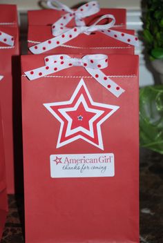 two red bags with white stars on them