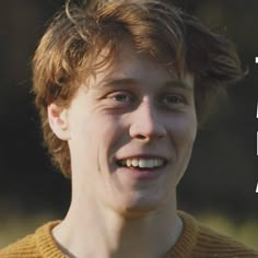 a young man smiling and looking at the camera with an inspirational quote above him that says, i am not afraid to learn anything